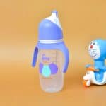 Playful 270 ml penguin-designed milk bottle, featuring an ergonomic shape and slow-flow nipple, safe and fun for babies' feeding time.