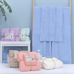 Two soft, fluffy microfiber baby bath towels in gentle colors, perfect for wrapping and drying your baby after bath time, displayed on a neutral background to highlight their plushness and size.