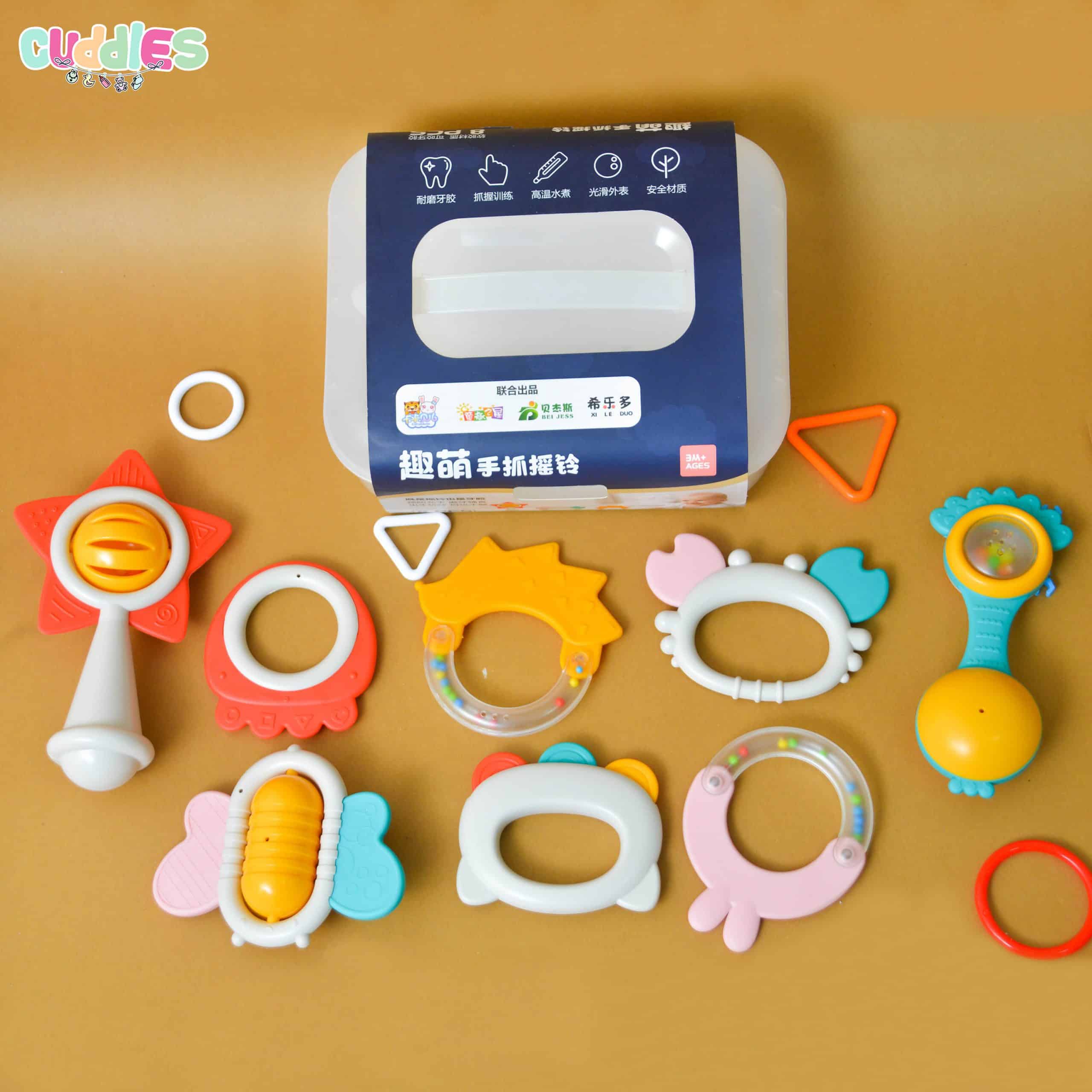 Colorful 8-piece baby gum set made of safe, non-toxic plastic, featuring a variety of textures and shapes for teething relief and sensory development.