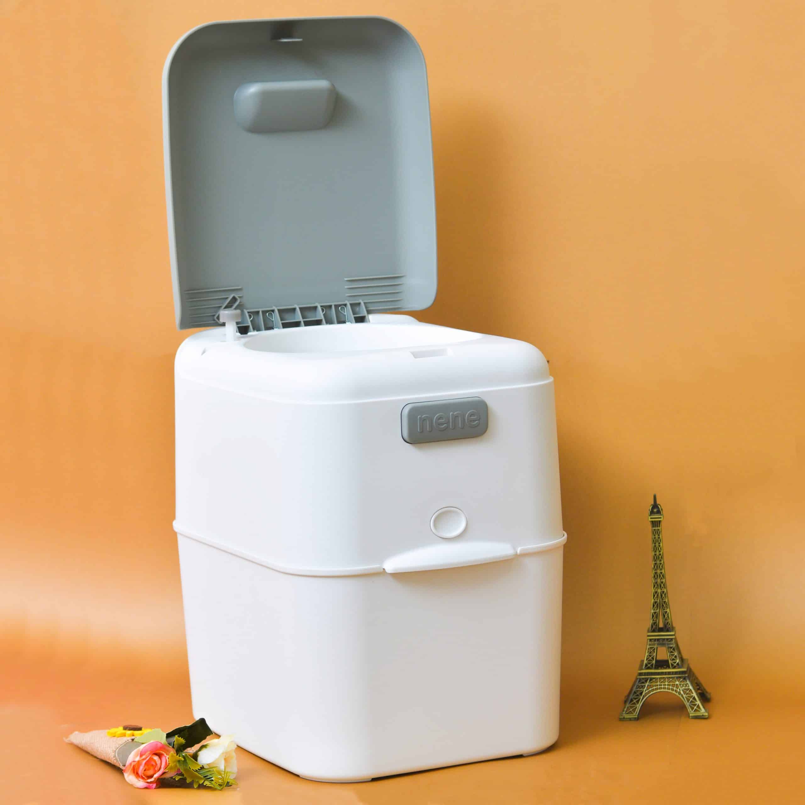 Automatic diaper bin in sleek design, featuring touchless disposal system to lock in odors, perfect for nurseries.