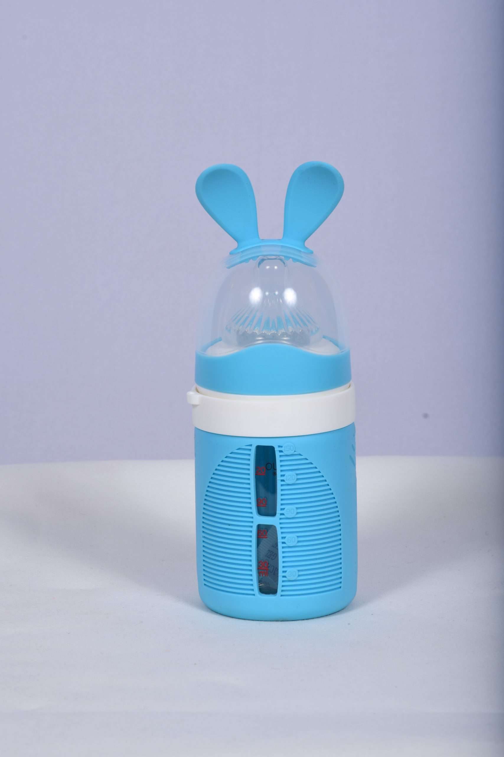 A transparent glass milk bottle with a capacity of 120 ML, featuring a tight-sealing white lid on top. The bottle's clear glass showcases the liquid inside, making it easy to see the content level. Perfect for a feeding a baby.