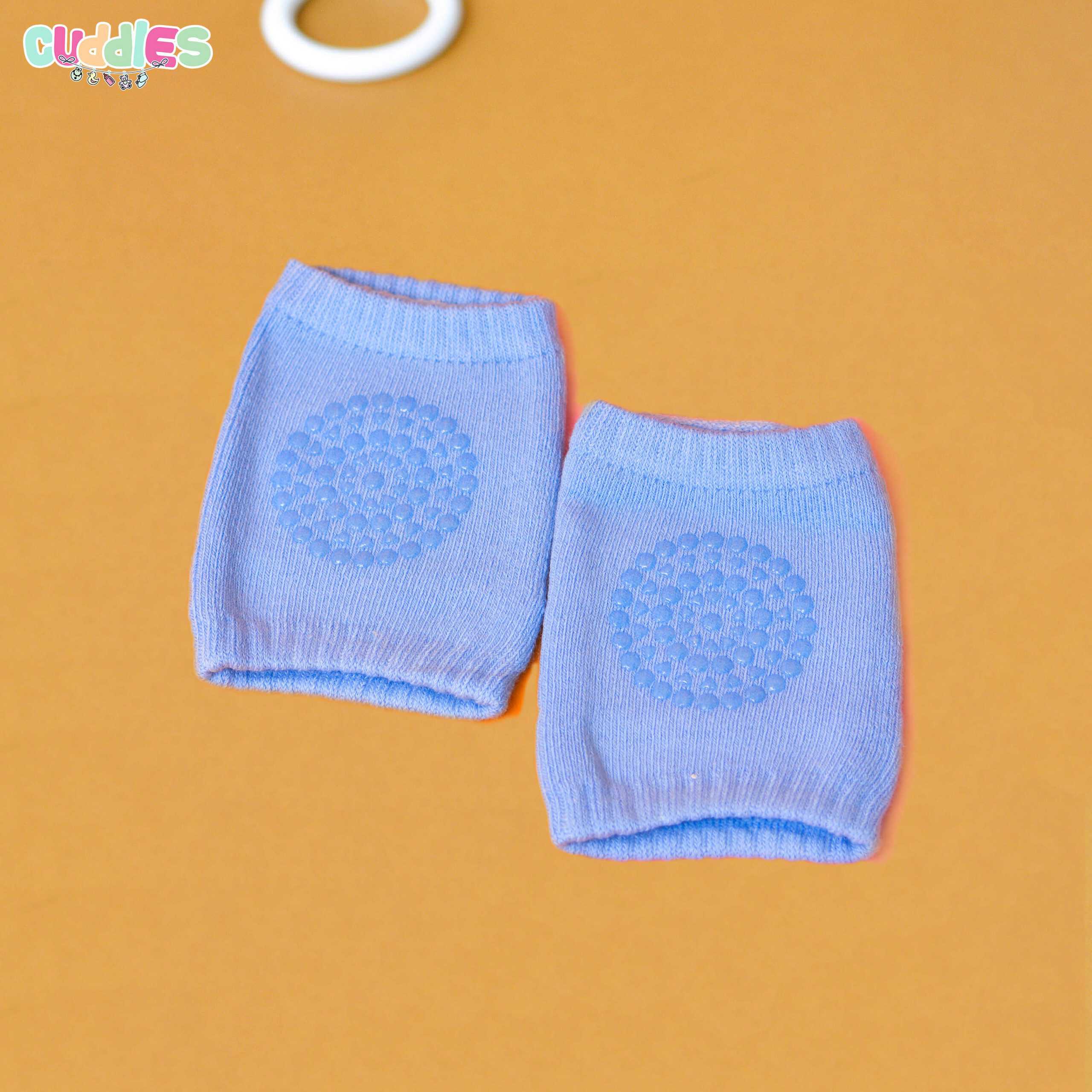 Soft, cushioned baby knee pads in a stretchy, breathable fabric, designed to protect little knees during crawling on various surfaces.